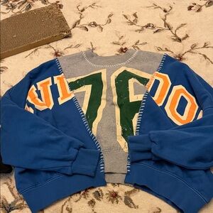 Blue and Gray Sweater with Green and Orange Accents